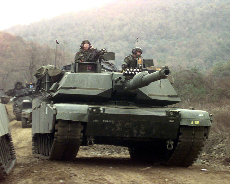 1024px-M1A1_Twin_Bridges_training_area_2C_Republic_of_Korea_1-23_Infantry