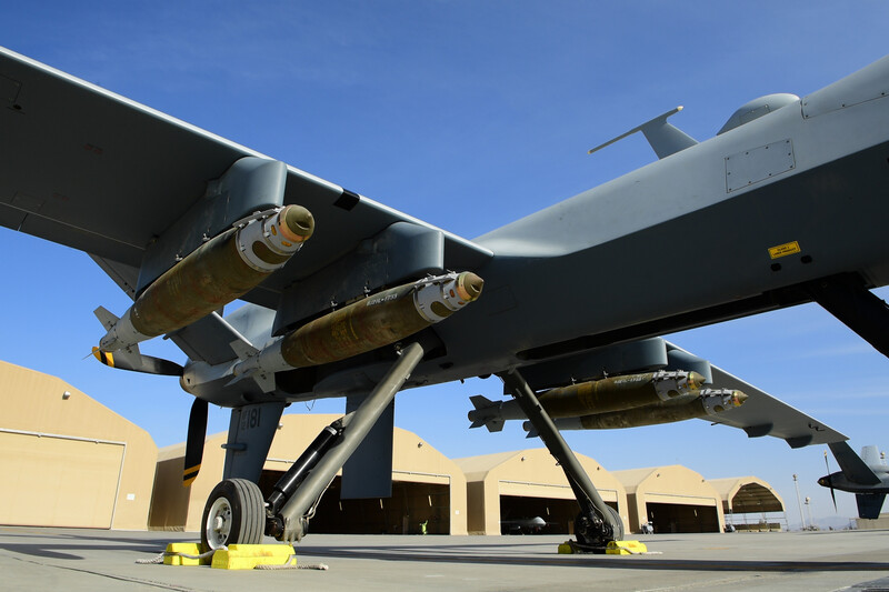 An_MQ-9_Reaper_armed_with_four_GBU-38_JDAM_parks_on_a_flightline_on_Kandahar_Airfield,_Afghanistan_in_February_2018_-_3