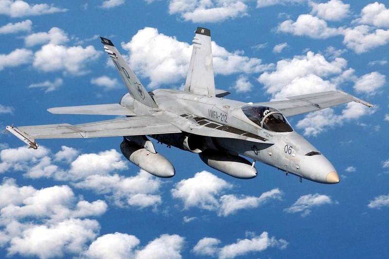 1280px-McDonnell_Douglas_FA-18C_Hornet_of_VMFA-212_in_flight_over_the_South_China_Sea_on_8_October_2003_(6638451)