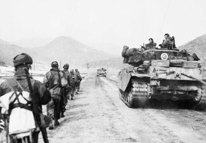 Centurion_tanks_and_infantry_of_the_Gloucestershire_Regiment_advancing_to_attack_Hill_327_in_Korea_March_1951._BF454