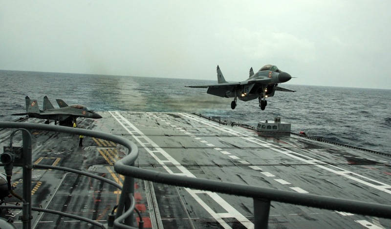 A_MiG-29K_performs_a_touch_and_go_landing_on_INS_Vikramaditya_during_Narendra_Modi's_visit