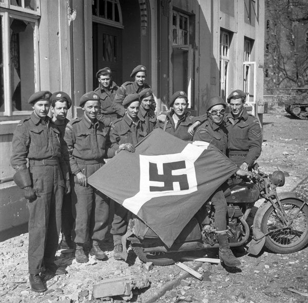 Captured_German_flag,_Friesoythe,_Germany,_16_April_1945
